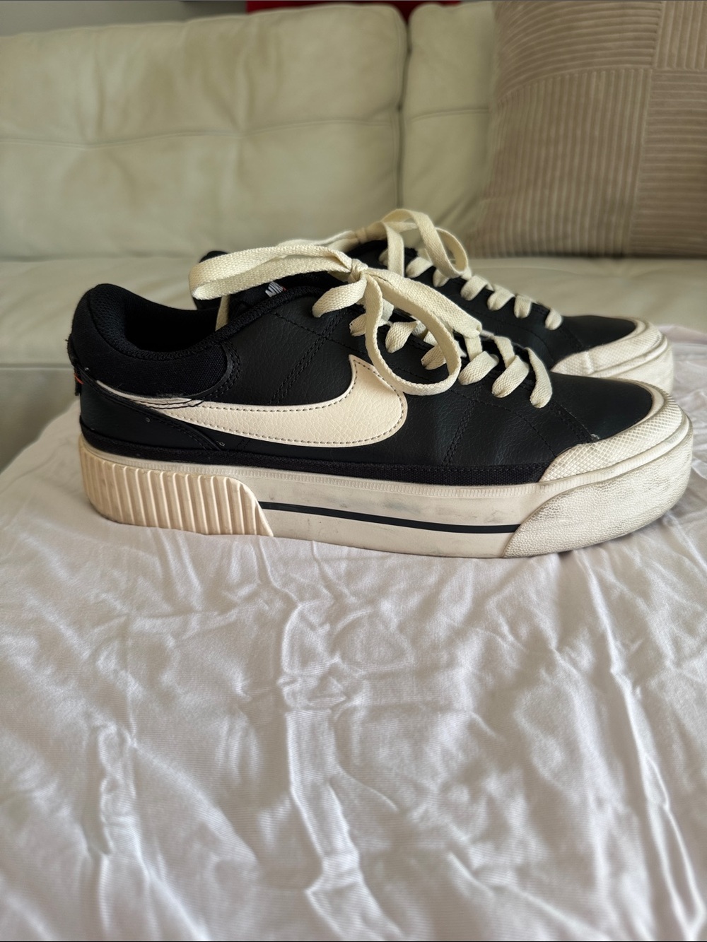 Nike Black Sneakers with Cream Accents - Good Condition